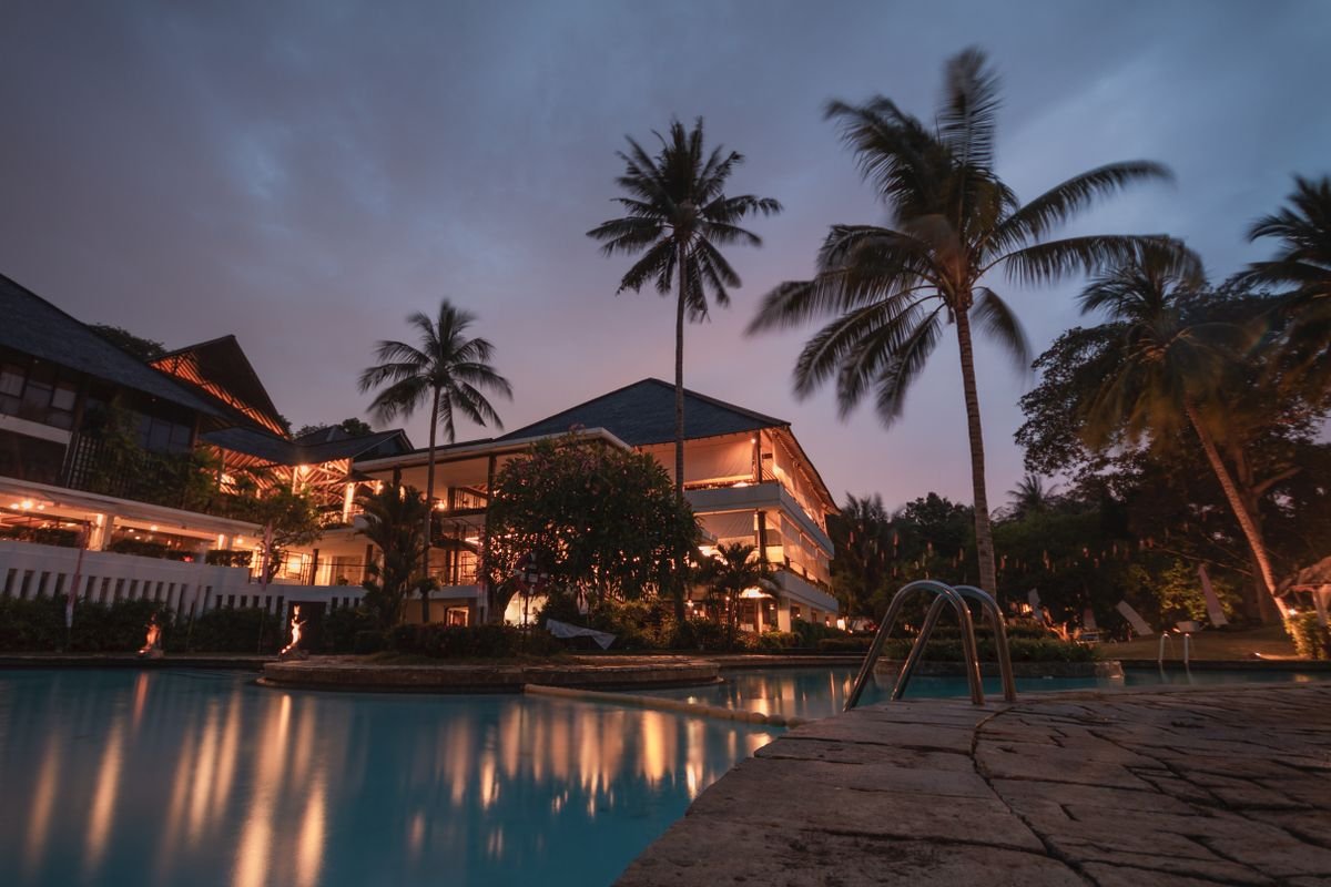 Private villa estate and pool at dusk, Tulum, Mexico